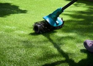 how to make artificial grass stand up